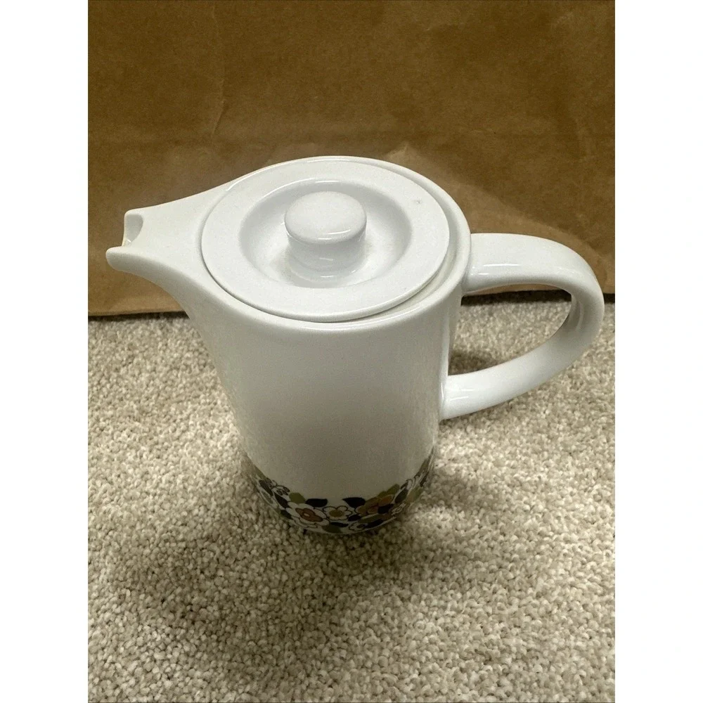 Vintage cream pitcher in the retro floral, manufactured by Suisse Langenthal